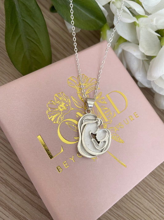 A Mothers Love Keepsake Necklace - Elegant Sterling Silver Pendant