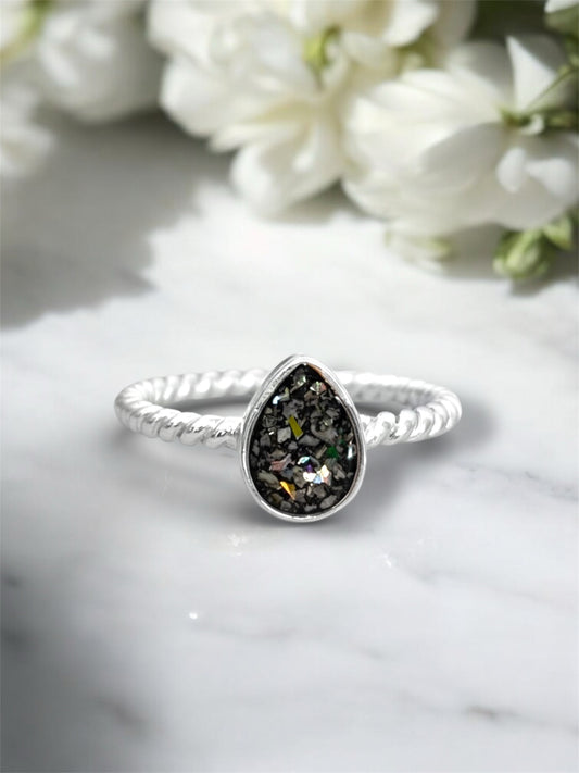 Sterling silver pear shaped ring made with ashes. 