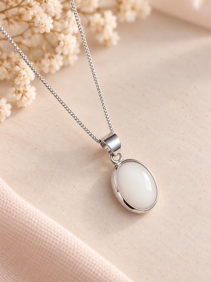 Oval sterling silver breastmilk pendant to commemorate your breastfeeding journey 