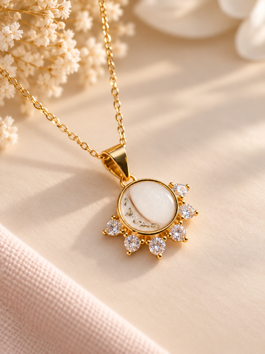 A beautiful breastmilk and hair keepsake necklace made for a mother to honour her motherhood journey 