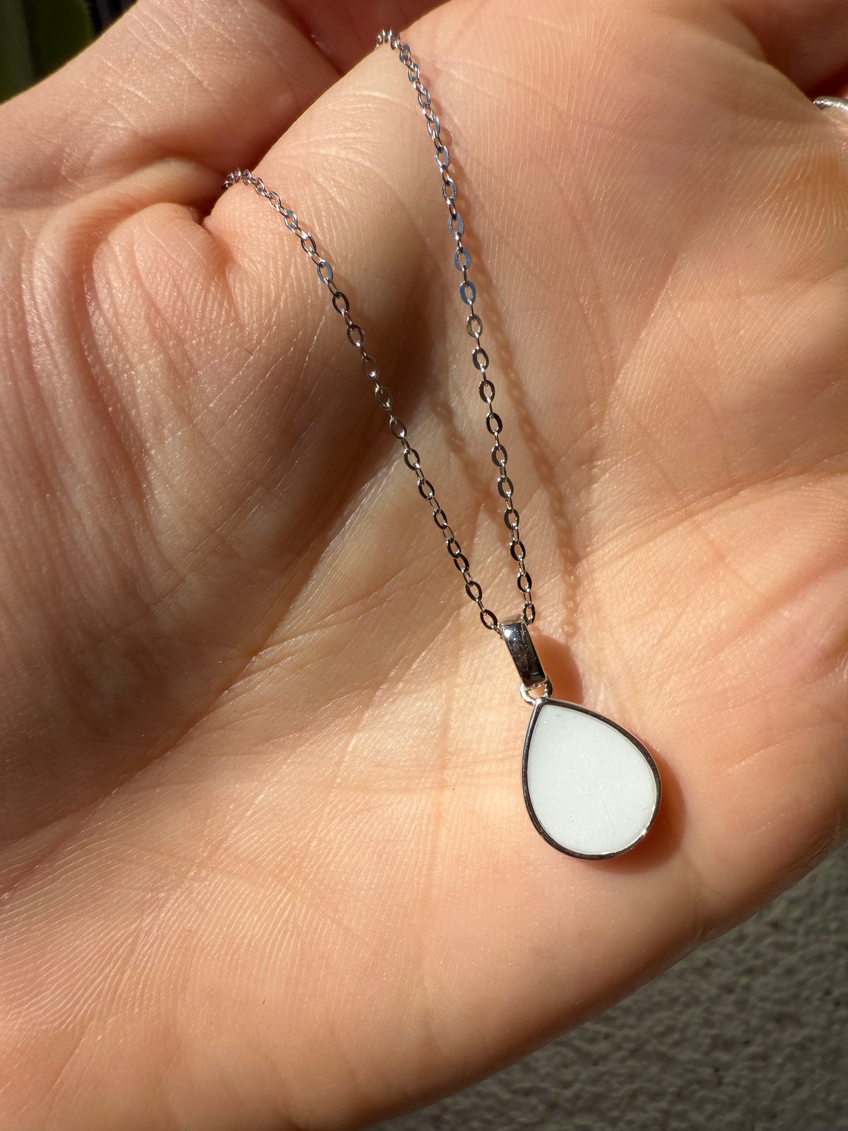 Breastmilk keepsake necklace made with preserved breastmilk in sterling silver