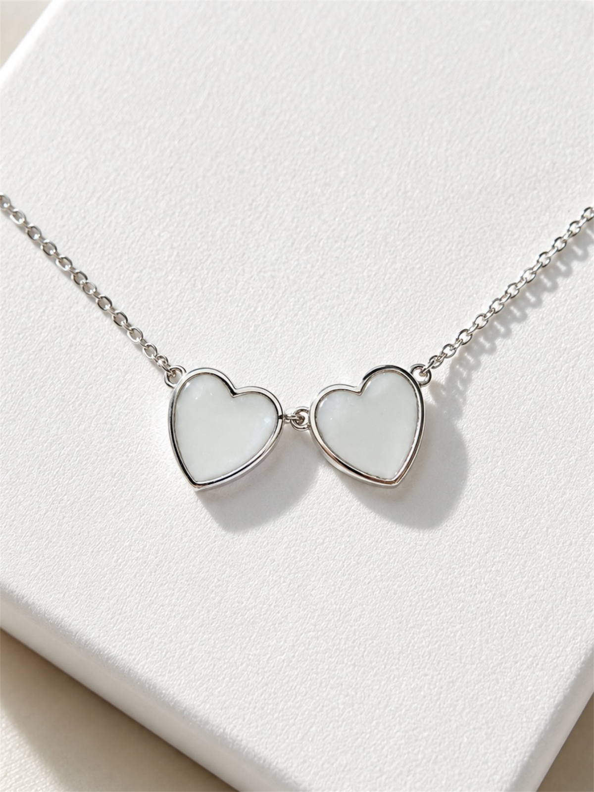 Beautiful breastmilk memory necklace made to preserve a special breastfeeding journey