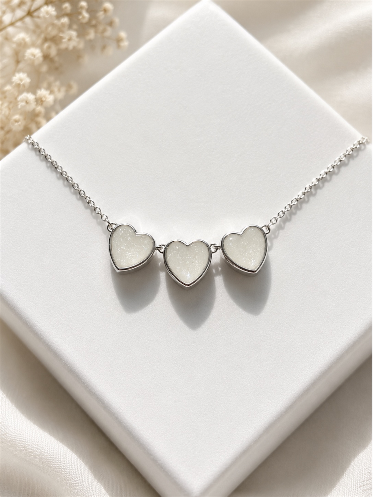 Breastmilk keepsake necklace made for a mother to treasure her breastfeeding journey