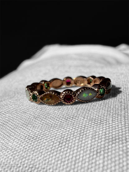 Rose gold plated ring containing preserved breastmilk and umbilical cord. 